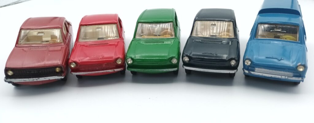DAF LION CAR vues de face : 66 coupé brun rouge, 55 coupé rouge, 44 break verte, 44 berline vert foncé, 33 fourgonnette bleue